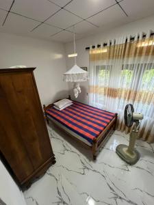 Postel nebo postele na pokoji v ubytování Gamage Stay Madiha + 27 fotografií