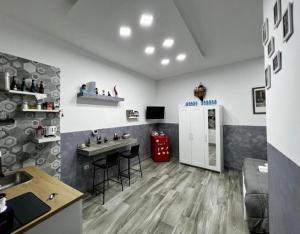 Televiisor ja/või meelelahutuskeskus majutusasutuses B&B MIRAGLIA