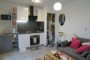 Kuchyň nebo kuchyňský kout v ubytování Appartement Cosy & Chaleureux