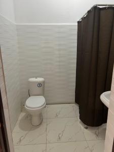 Salle de bains dans l'établissement Nomad School Hostel