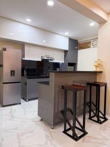 Kuchyň nebo kuchyňský kout v ubytování Maison Kololo