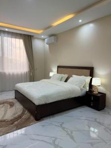 Postel nebo postele na pokoji v ubytování Maison Kololo + 10 fotografií