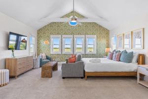 Ένα ή περισσότερα κρεβάτια σε δωμάτιο στο LayLow - Hot Tub, Arcade & Golf