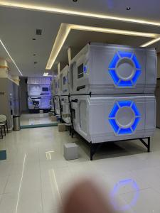 a row of medical equipment on display in a room at Nano Pod Yotel in Surat +10 photos
