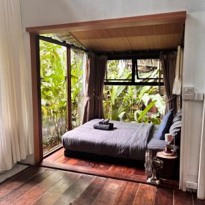 Ένα ή περισσότερα κρεβάτια σε δωμάτιο στο Bannaimong Natural Springs