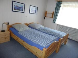 Postel nebo postele na pokoji v ubytování Ferienwohnung Vogel
