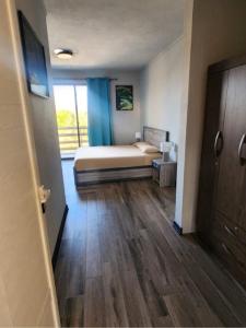 Postel nebo postele na pokoji v ubytování Grace Villa + 11 fotografií