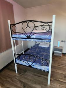 Postel nebo postele na pokoji v ubytování Grace Villa