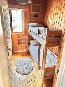 Postel nebo postele na pokoji v ubytování Koselig familiehytte med peis og utsikt nær skiløyper og turterreng