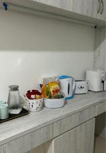 Η κουζίνα ή μικρή κουζίνα στο Ella Residence Roomstay