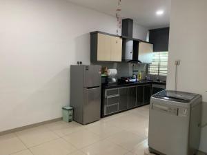 Η κουζίνα ή μικρή κουζίνα στο Js Homestay