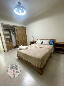 Ένα ή περισσότερα κρεβάτια σε δωμάτιο στο RIKI R Boca del Mar III Apartment 406 +13 φωτογραφίες