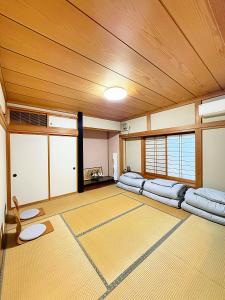 Postel nebo postele na pokoji v ubytování Sky House R1