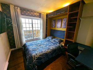 Postel nebo postele na pokoji v ubytování The Modern Stays