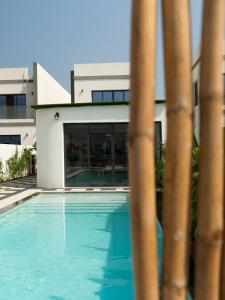Πισίνα στο ή κοντά στο Jungle Breeze Villa, Al Dana Villas