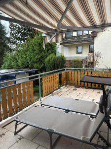 Stolní tenis v ubytování Ferienwohnung in Rheinfelden an der Grenze zur Schweiz nebo okolí