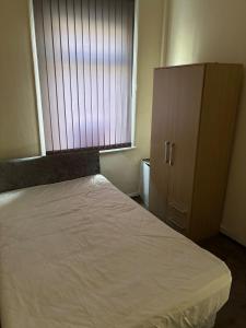 Voodi või voodid majutusasutuse 4 Bedroom House on the doorstep of Teeside Uni toas