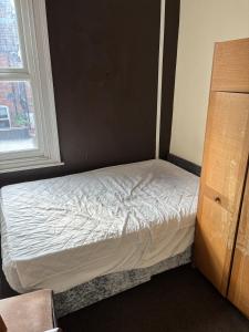 Voodi või voodid majutusasutuse 4 Bedroom House on the doorstep of Teeside Uni toas