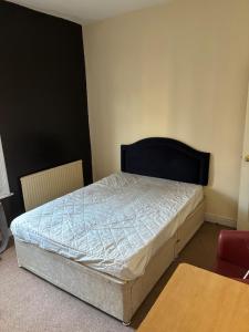 Voodi või voodid majutusasutuse 4 Bedroom House on the doorstep of Teeside Uni toas