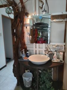 a bathroom with a sink and a counter top with a sink at With DiO in Setouchi +12 photos