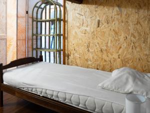 En eller flere senge i et værelse på Charmante maison de village