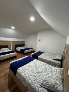 Ένα ή περισσότερα κρεβάτια σε δωμάτιο στο Ella Residence Roomstay