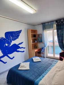 Postel nebo postele na pokoji v ubytování Appartamento Santa Rita + 23 fotografií