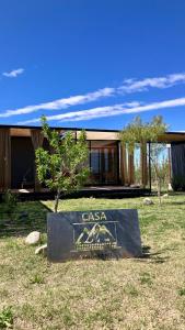 a house with a sign in front of it at Casa Vino Andino in La Consulta