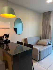 Posezení v ubytování Flat com piscina privativa