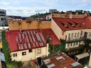 an overhead view of an old building with a red roof at Zizkov Stay - Close to Center in Prague