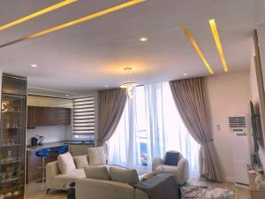 Un lugar para sentarse en Elysian Villa