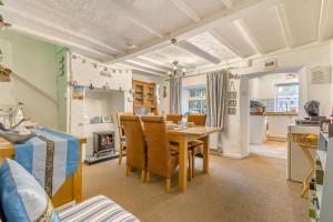 a kitchen and dining room with a table and chairs at 2 Bed in East Rudham oc-t33378 in East Rudham