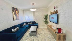 Posezení v ubytování T6 Luxury in Témara Discover a Comfortable Apartment