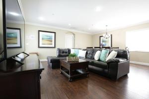 a living room with a couch and a table at Destination #11 in Anaheim