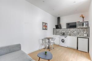 Køkken eller tekøkken på Cosy Studio Cité Pilleux