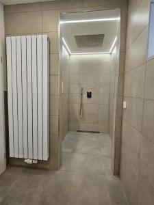 Koupelna v ubytování Boutique-Apartments