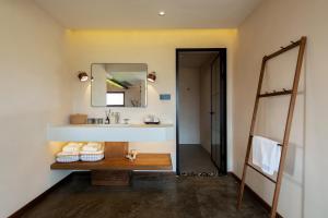 Ένα ή περισσότερα κρεβάτια σε δωμάτιο στο Lijiang Tennessee Farmhouse hotel +136 φωτογραφίες