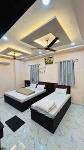 Ένα ή περισσότερα κρεβάτια σε δωμάτιο στο Kashi palace +12 φωτογραφίες