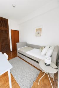 Soar Home l Airport l Olivaisにあるシーティングエリア