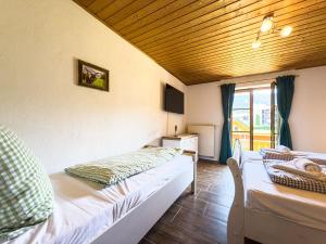 Postel nebo postele na pokoji v ubytování Landhaus Steibis - Hochgrat