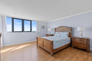 Postel nebo postele na pokoji v ubytování Horizons 202 + 63 fotografií