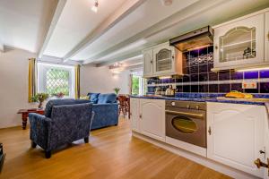 Η κουζίνα ή μικρή κουζίνα στο 2 Bed in Advent oc-s6025 +20 φωτογραφίες