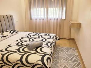 Postel nebo postele na pokoji v ubytování Studio Luxe Nouaceur