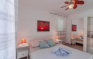 Ένα ή περισσότερα κρεβάτια σε δωμάτιο στο Villa Marinovic by Villas Guide +30 φωτογραφίες