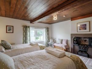 Ένα ή περισσότερα κρεβάτια σε δωμάτιο στο 2 Bed in Croglin 83330