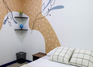 Ένα ή περισσότερα κρεβάτια σε δωμάτιο στο S23 I City Lodge