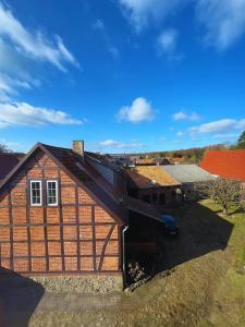 an overhead view of a house with a roof at Haevn Altes Pfarrhauss Marienfliess in Stepenitz