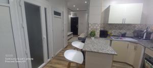 Kuchyň nebo kuchyňský kout v ubytování Douera good