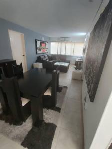 Et opholdsområde på Aguamarina Suites