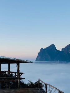 a view of a body of water with mountains in the background at Overnight Camping Peak Of Nong Khiaw in Nongkhiaw